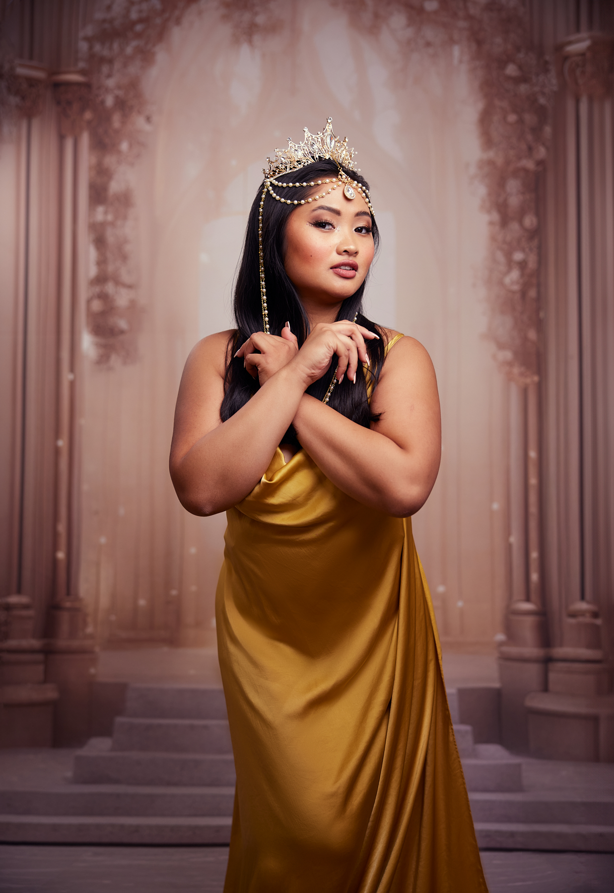 Client portrait in gold gown with crown
