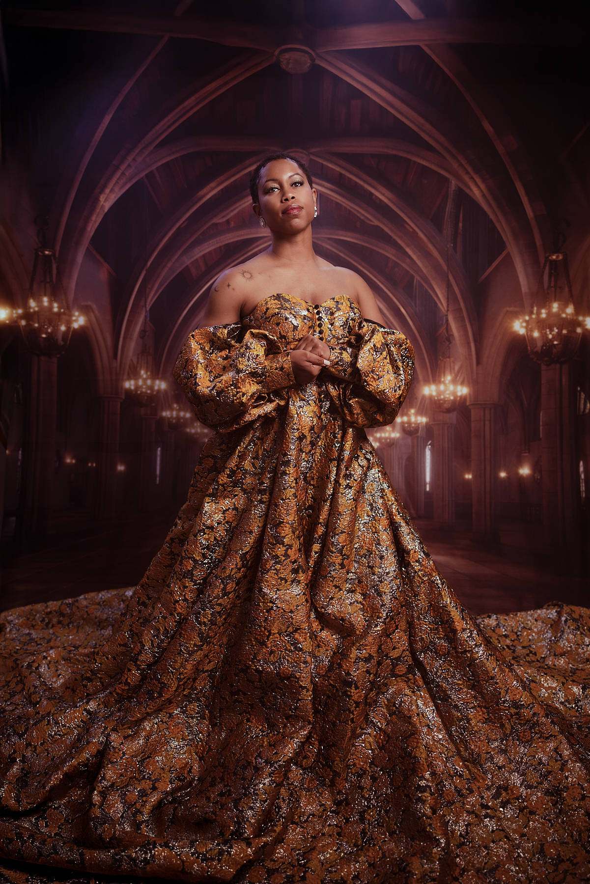 Client portrait in golden gown within a cathedral